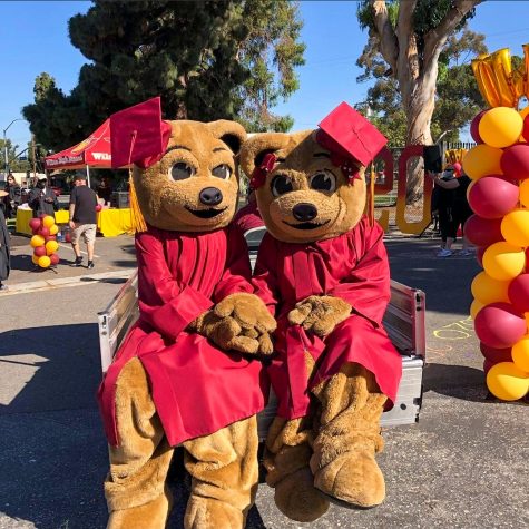 Woody and Wilma at 2020s drive-through graduation.