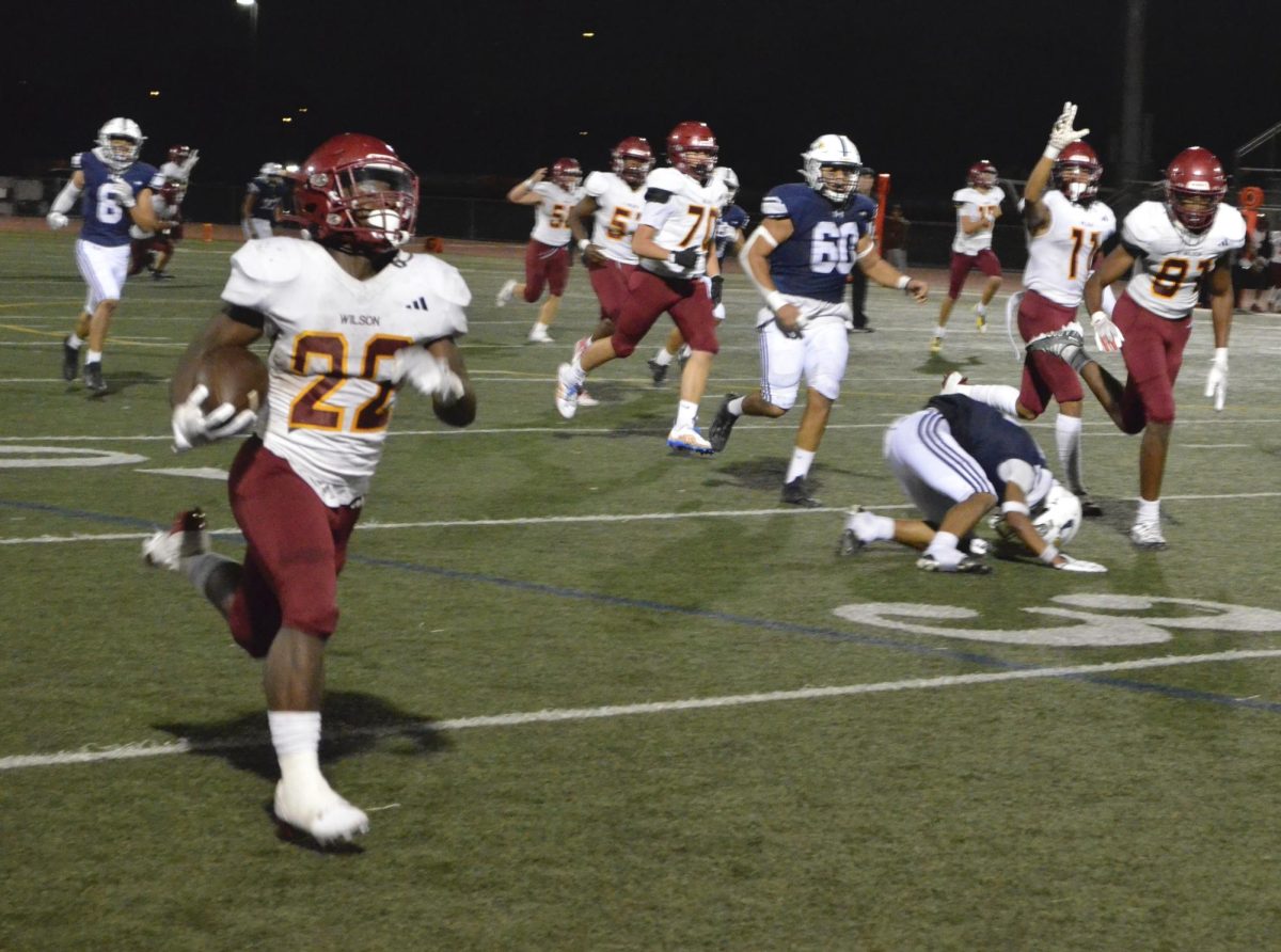 Jamell Edmonds running into the end zone at California High School.